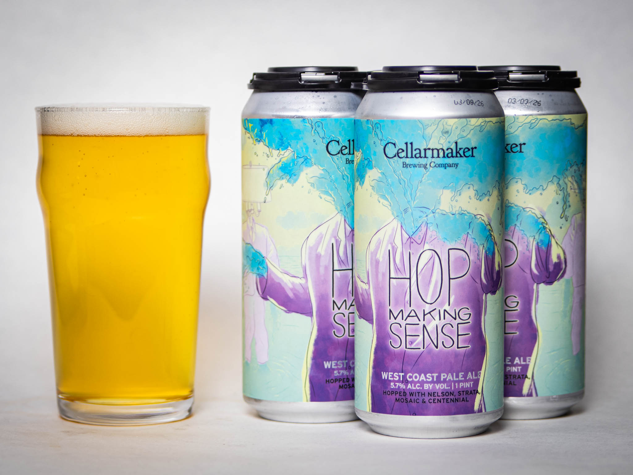A Pint Glass Of Pale Beer Sits Next To Three Cans Labeled “Hop Making Sense” By Cellarmaker Brewing Company, Featuring A Purple And Blue Abstract Design.