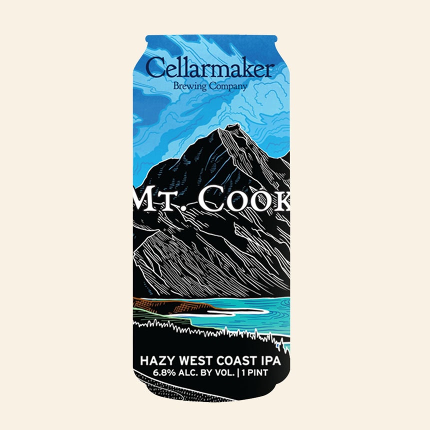A Beer Can Labeled “Cellarmaker Brewing Company Mt. Cook” With Mountain And Lake Art. Text Reads, “Hazy West Coast Ipa, 6.8% Alc. By Vol., 1 Pint.” The Background Is Blue Sky And Black Mountains.