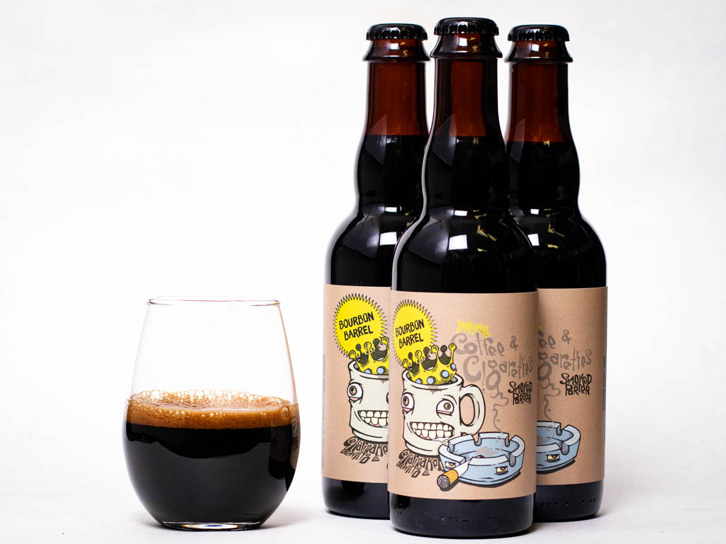 Three Bottles Of Coffee &Amp;Amp; Cigarettes Smoked Porter Next To A Glass Of Dark Beer.