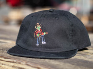 Black Double Dobis Shirt baseball cap with an embroidered graphic of a cowboy playing a guitar.